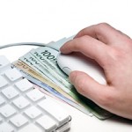 Cash under a computer mouse